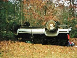 SUV laying on its roof following rollover
